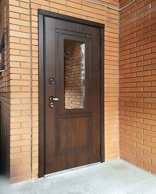 Уличная дверь с ковкой